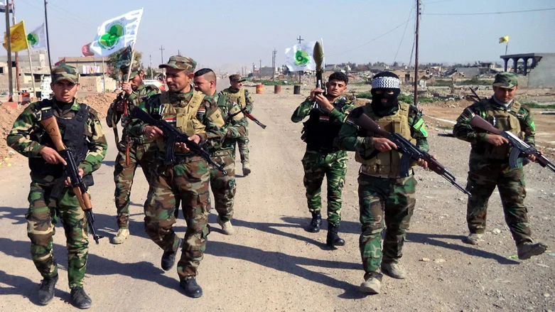 تحلیلگر عراقی با انتقاد از آمریکایی‌ها: سَرِ الحشد الشعبی را می‌خواهند!