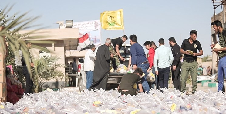 امدادرسانی نیروهای «نجباء» عراق به سیل‌زدگان خوزستان+تصاویر